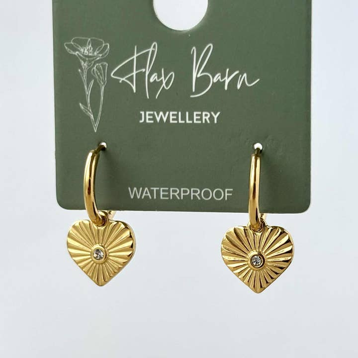 Tarnish Resistant Burst Zirconia Heart Huggies for wholesale by Flax Barn