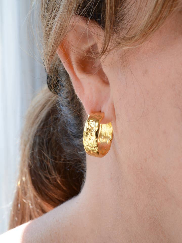 Gold textured hoops with post for wholesale by AJS Design Studio