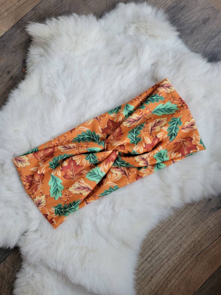 Orange with fall leaves for wholesale by Sew fashionable headbands