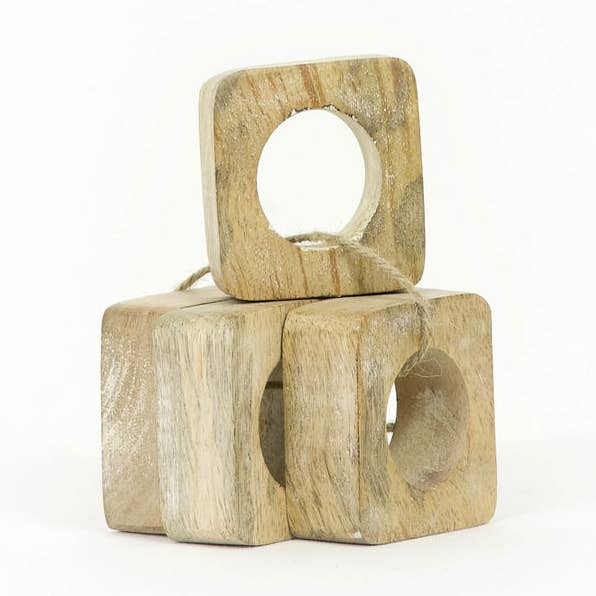 11551 - 2x2x1 Mango wood napkin rings Set/4 CLEARANCE for wholesale by Devanie At Home (Formerly Adams & Co.)