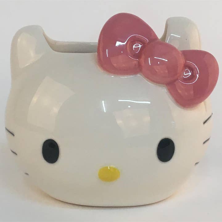 Hello Kitty Figural Head Candle 14Oz for wholesale by Blue Sky Clayworks