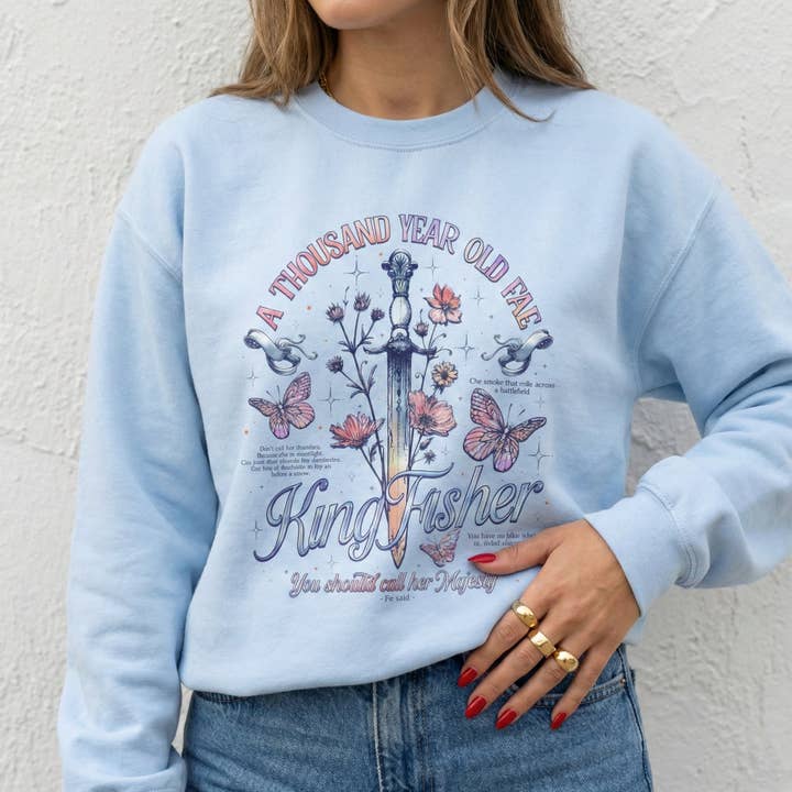 MagicMerchEmporium - Wholesale Graphic Sweatshirt - Women's - Kingfisher "A Thousand Year Old Fae" Sweatshirt3