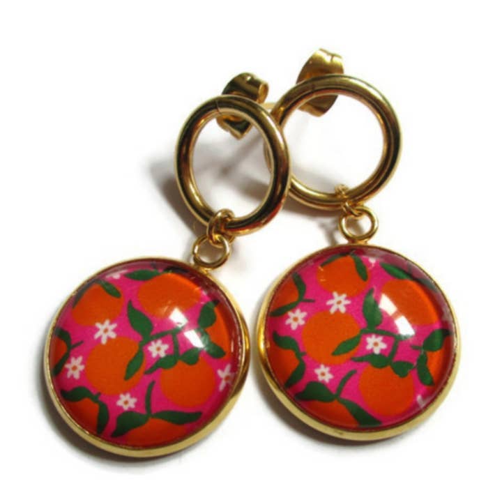 ORANGE DANGLING EARRINGS on pink background, gold or silver finish for wholesale by Dans l'Air du Temps Bijoux