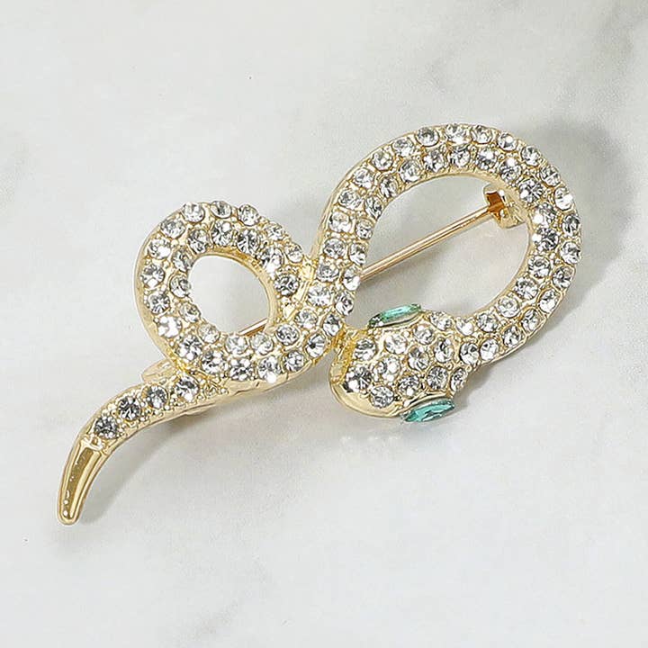 Slangeformet broche med stenbelagt nål for engroshandel hos Sensibling Corp.