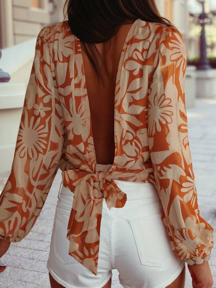 Orange Floral Print Knotted Open Back Long Sleeve Blouse for wholesale on Faire