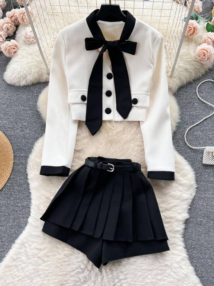 Cropped Jacket and Pleated Skort Set and other Purchase Wholesale skort set. Free Returns & Net 60 Terms on Faire trending on Faire.