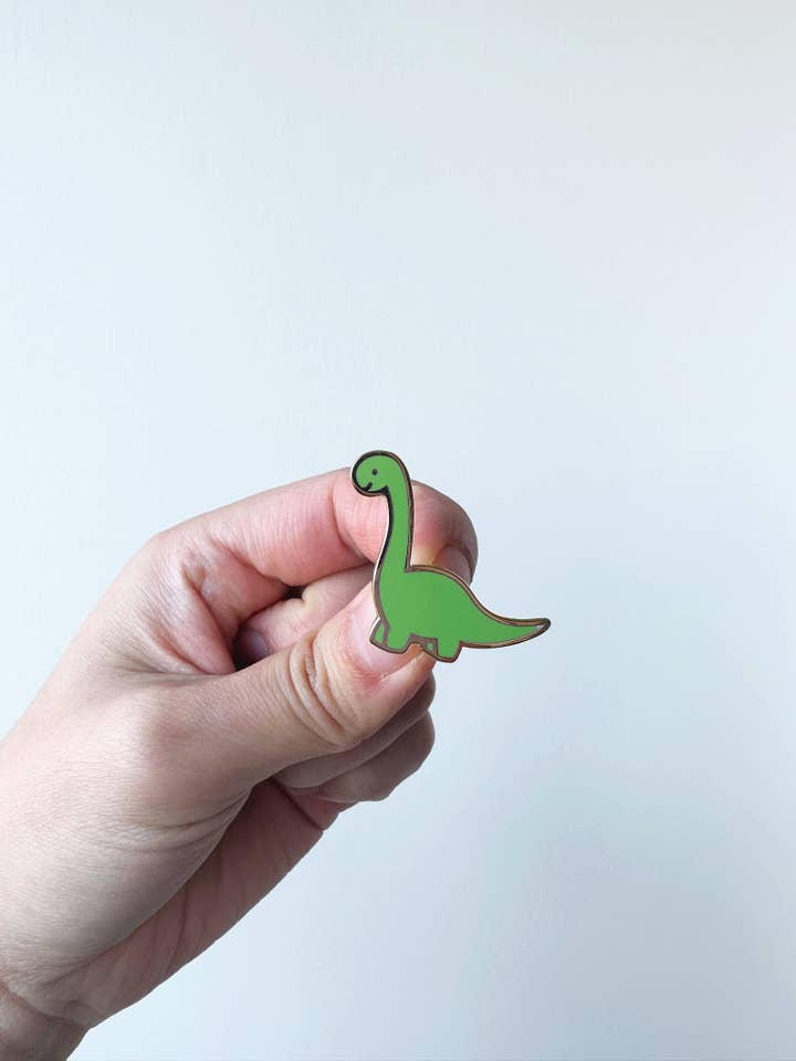 Green Dinosaur Enamel Pin for wholesale by Tickle Me Lavender