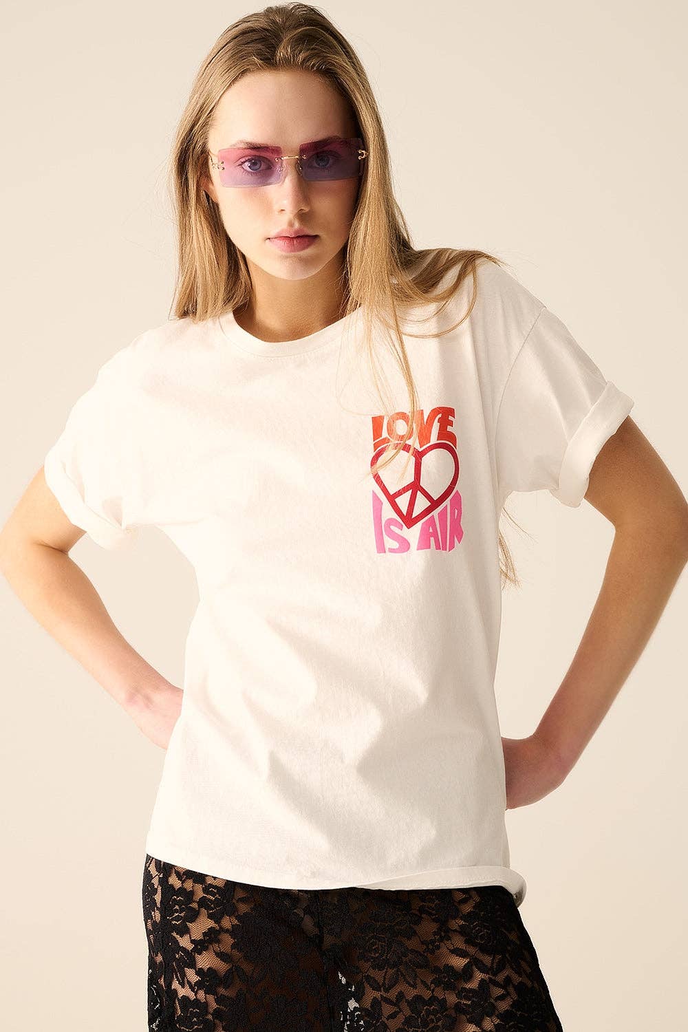 White T-Shirt with Love is Air and Heart with Peace logo for wholesale on Faire6
