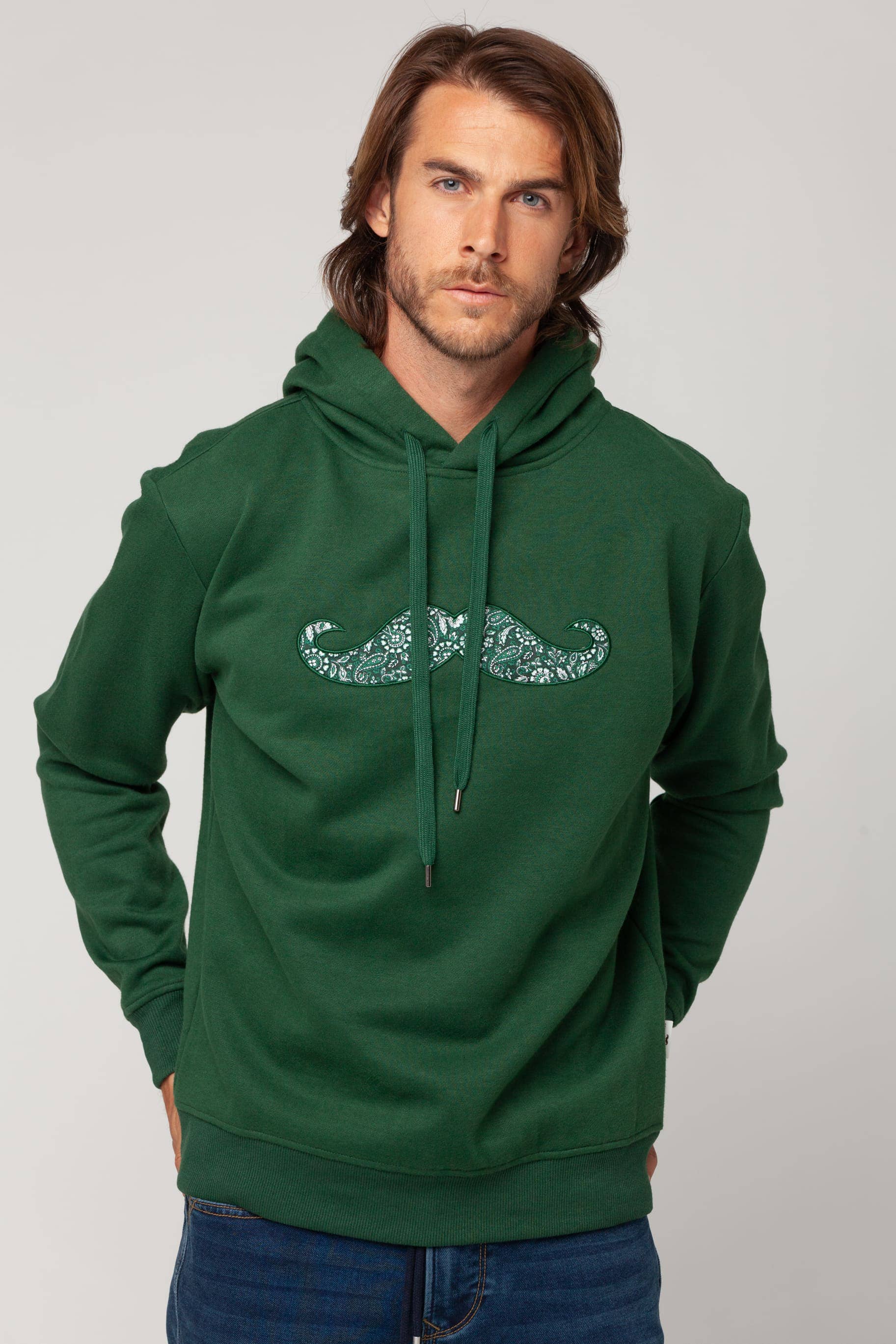 Green Hoodie with Mustache Logo Cantera model for wholesale on Faire
