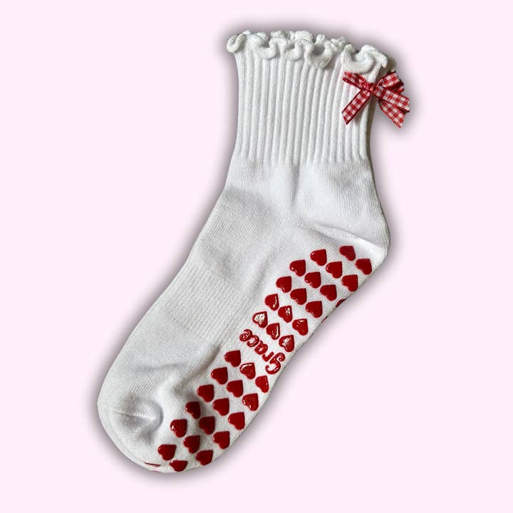White ruffle grip sock with red gingham bow for wholesale by MollyGraceGripSocks