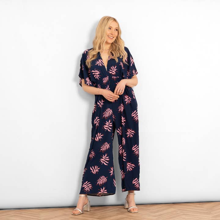 Palm Leaf Print Jumpsuit with V Neckline in Navy Blue Pink for wholesale by Sarta
