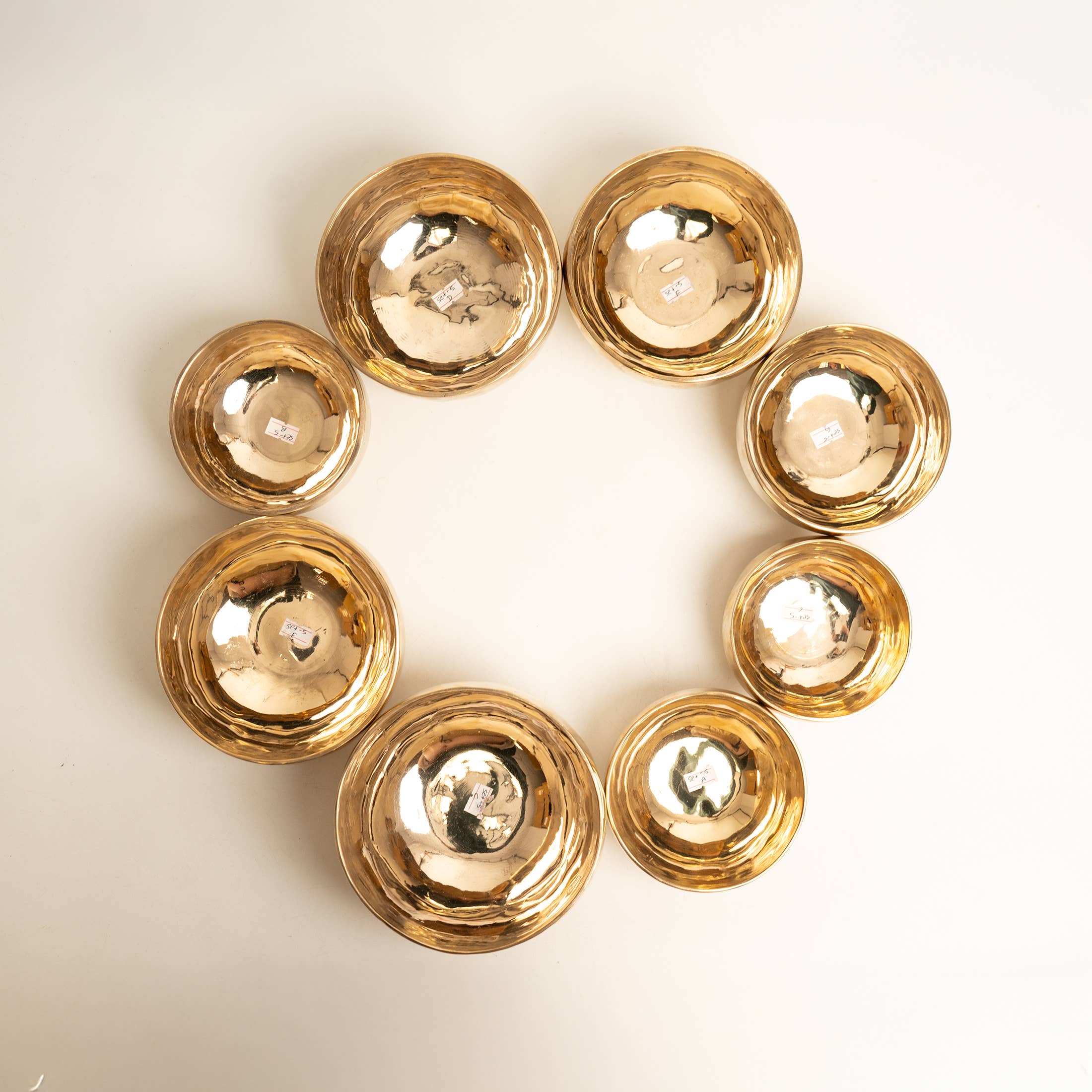 ART HIMALAYAN TRADING LTD - Wholesale Meditation Supplies - Profesionally tuned 8 bowl set of Handmade Singing bowl 1