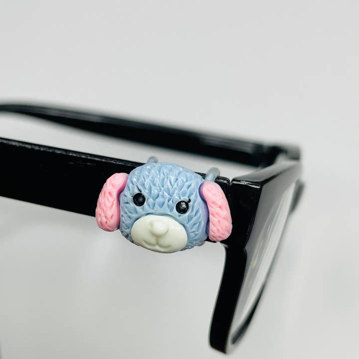 Blå hund med rosa öron harts EyeDeco för wholesale av Cork and Charm