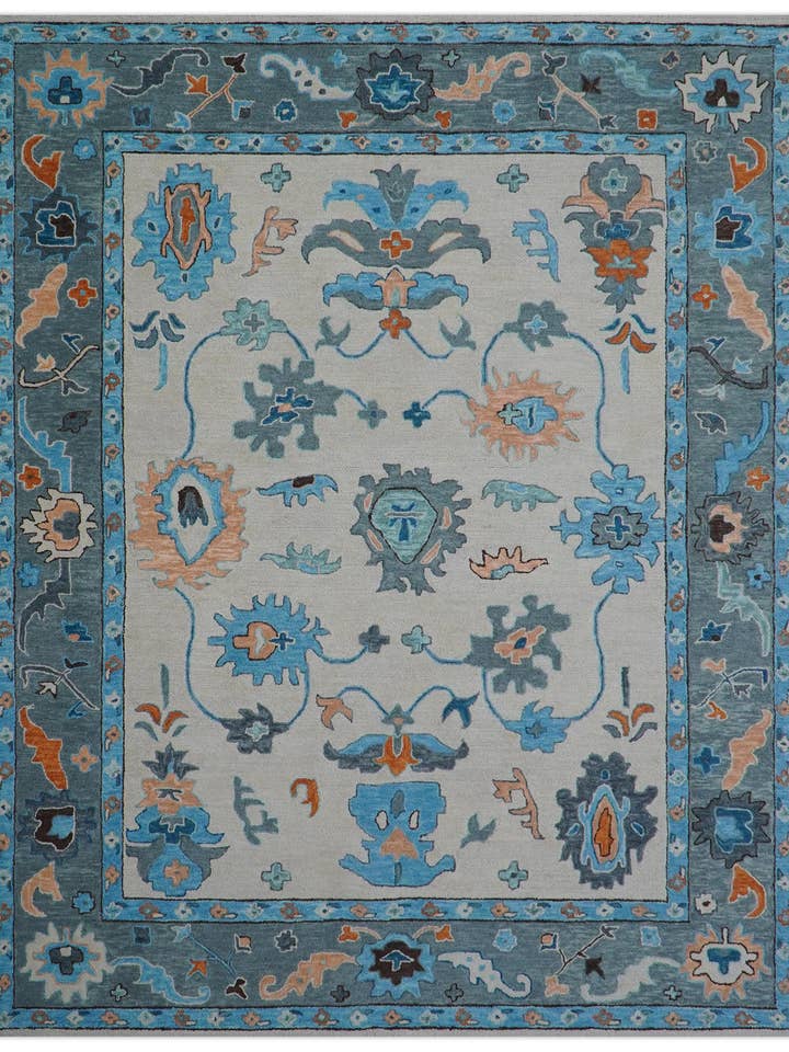 Allure Custom Made Traditional Design Peach And Blue Hand Tufted Wool Rug for wholesale by The Rug Decor, Inc.