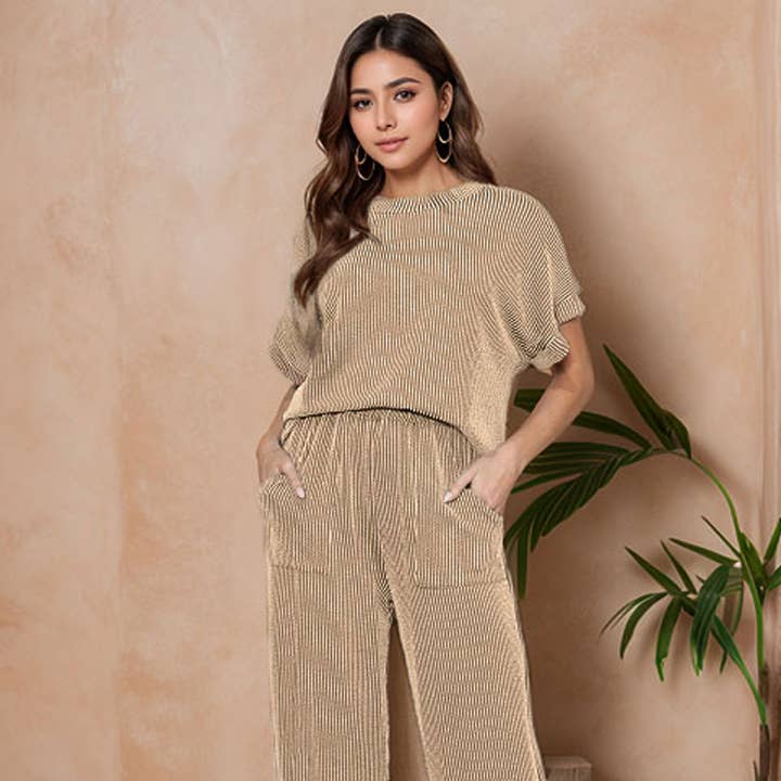 WAVERIB SHORT SLEEVE TOP AND PANTS SET and other Purchase Wholesale two piece short set. Free Returns & Net 60 Terms on Faire trending on Faire.
