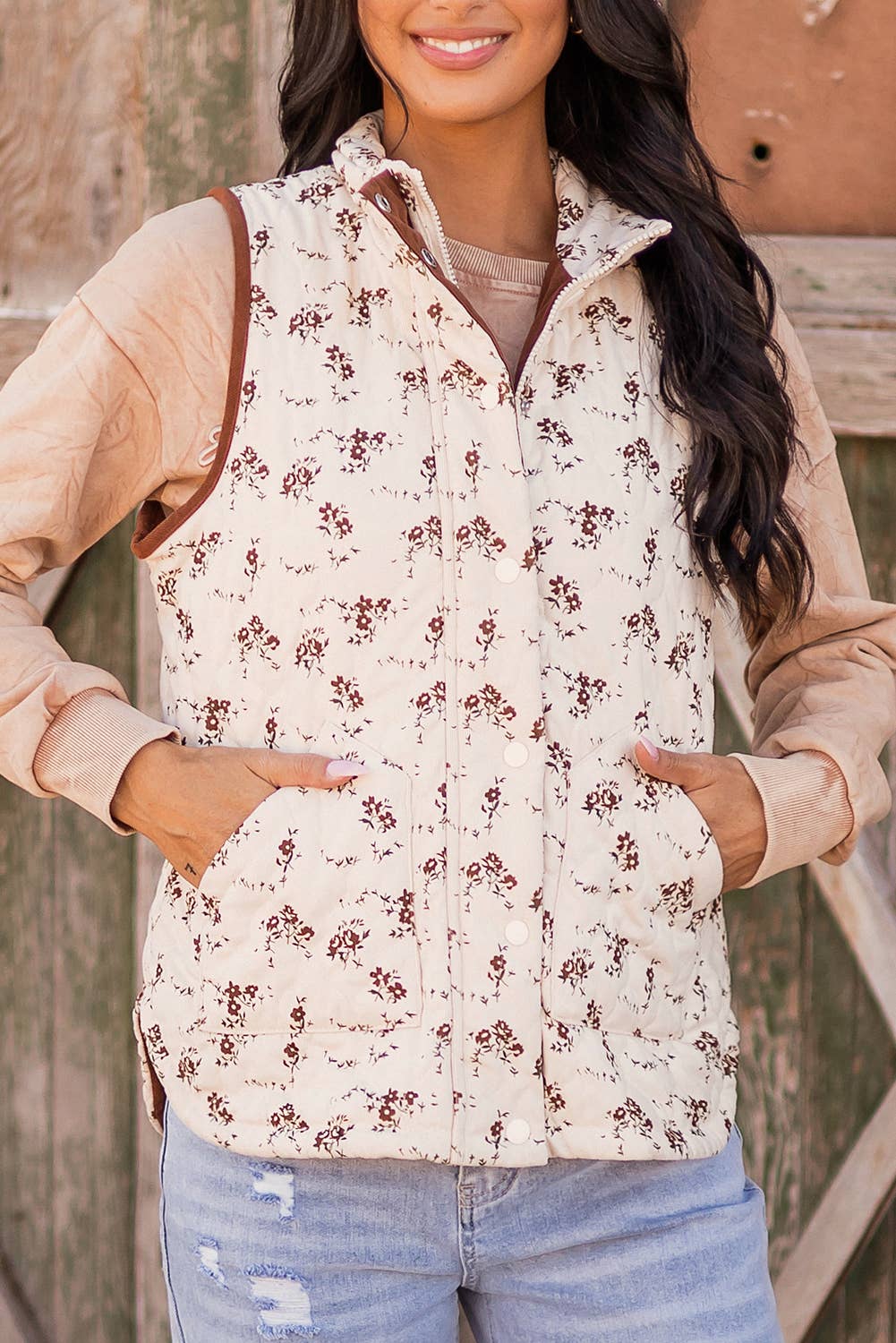 As shown Fashion-W Floral Print Zip Up Quilted Vest for wholesale on Faire6