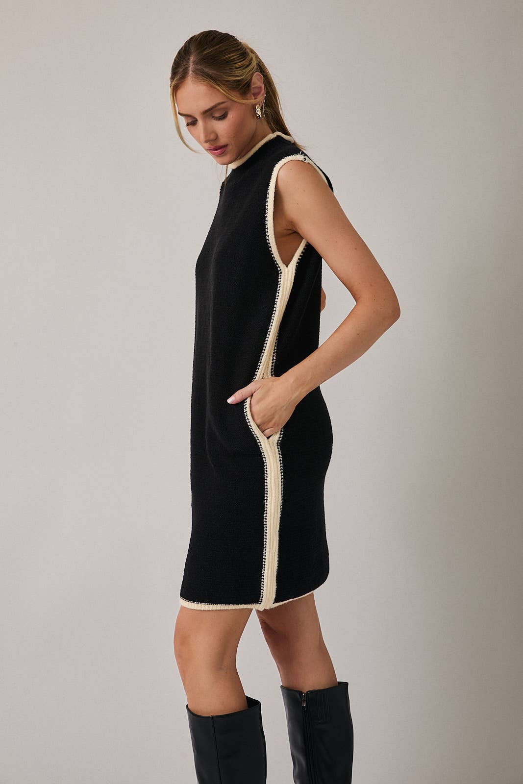 BLACK CREAM MOCK NECK SLEEVELESS SWEATER DRESS for wholesale on Faire1