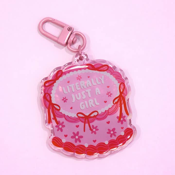 Just A Girl Cake Acrylic Keychain for wholesale by Posh Paperie