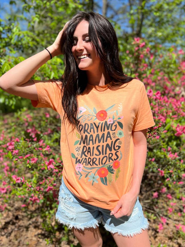 Praying Mama Raising Warriors Tee for wholesale by Adelle Linen