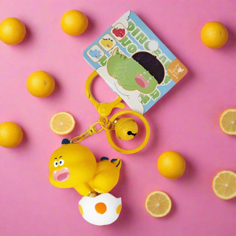 KiddieKickz – wholesale Keychain – Child – Cartoon Dinosaur Holding Egg PVC Soft Keychain2