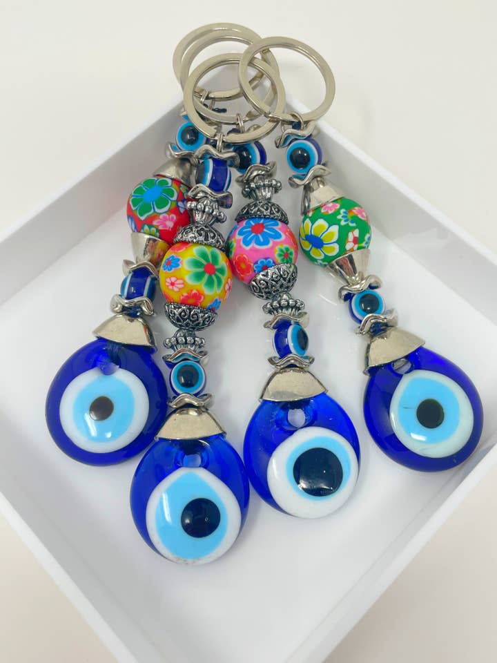 Porte-clés Œil Maléfique avec Perles de Fleurs pour la vente par Nai Gifts