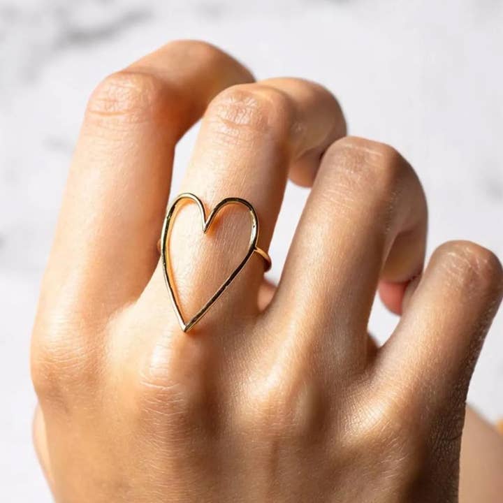 Amour Open your Heart Ring- Steel 18K  GoldPVD and other Purchase Wholesale open heart ring. Free Returns & Net 60 Terms on Faire trending on Faire.