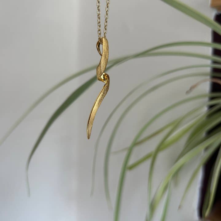 Beyond Biasa Gold Spiral Pendant for wholesale by Kirsty Taylor Goldsmiths