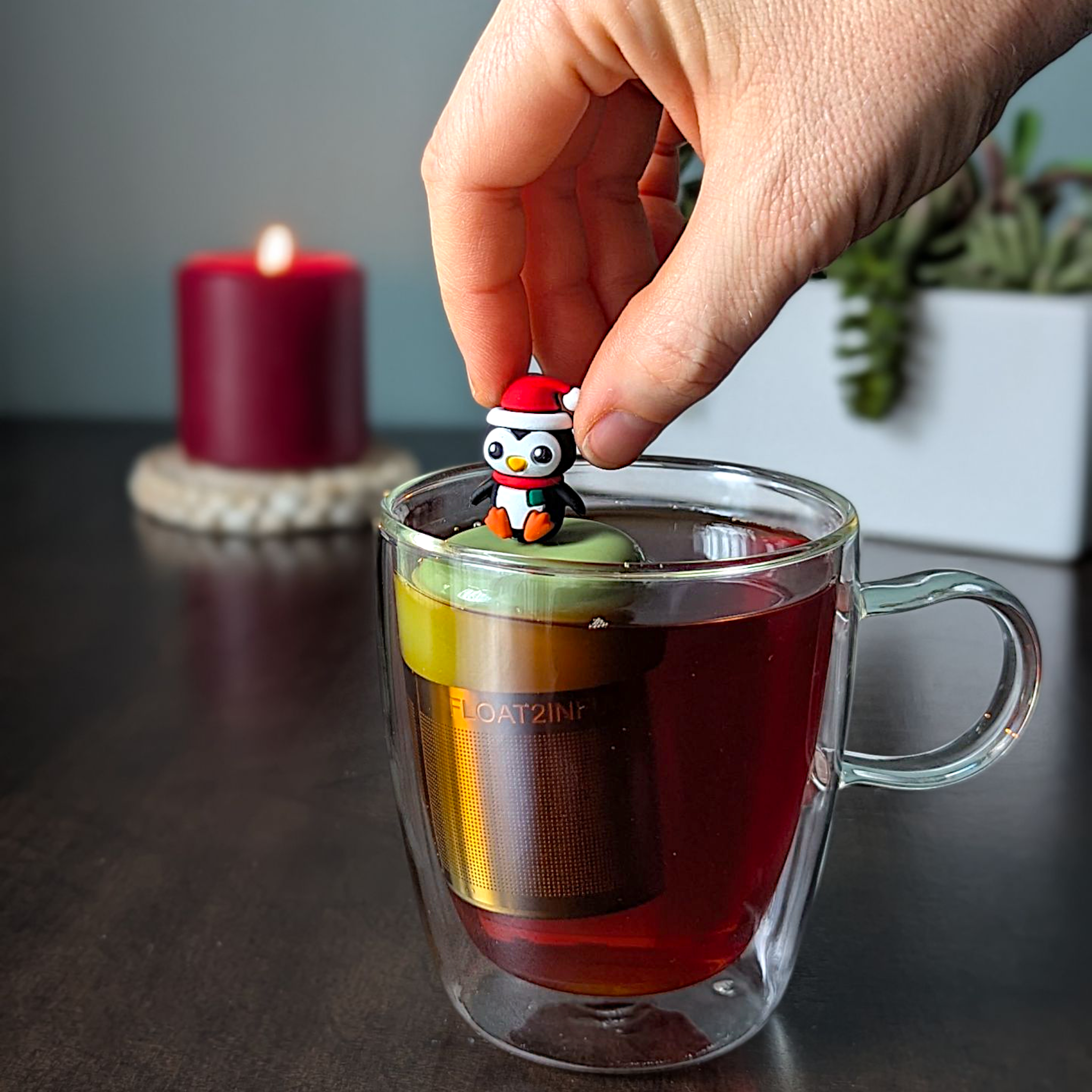 Float2infuse Tea Infuser - Wholesale Tea Strainer/Infuser - Christmas Penguin | Floating Tea Steeper | GreenBase | Black2