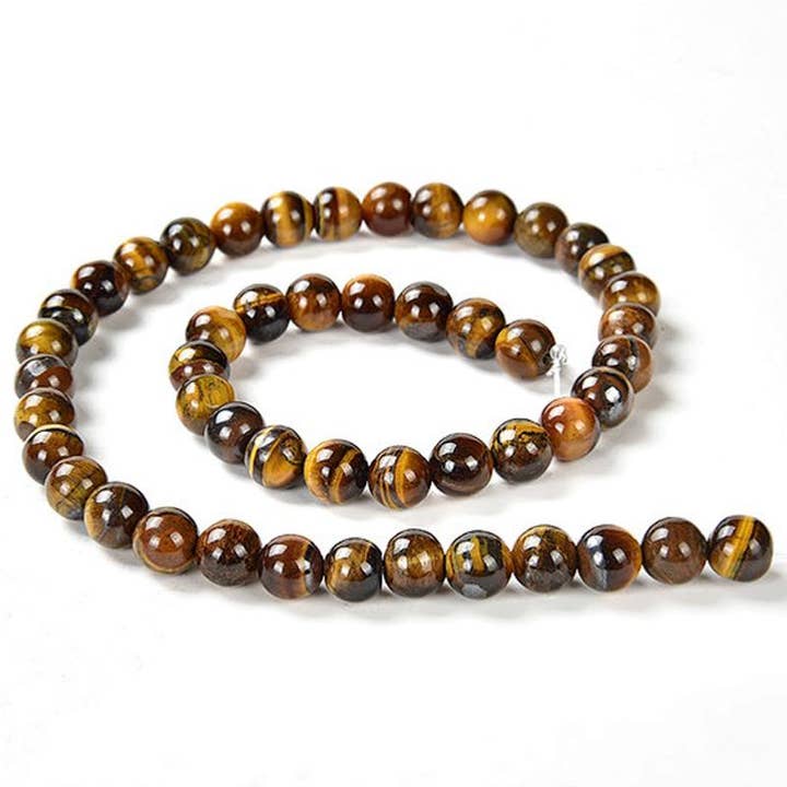 Tijgeroog kralen Zuid-Afrika A voor wholesale door La Boîte à Cailloux