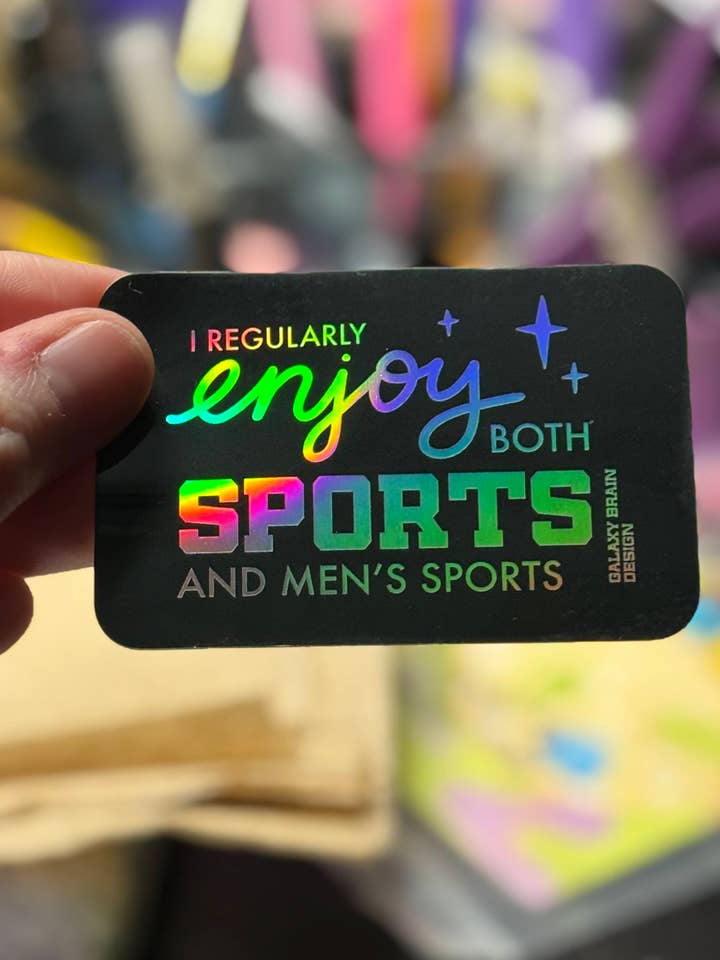 I Regularly Enjoy Both Sports and Men's Sports Holo Sticker for wholesale by Galaxy Brain Design
