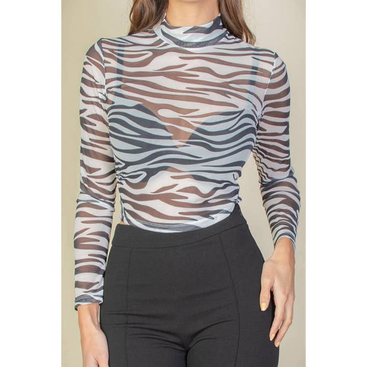 Zebra Print Mesh Top and other Purchase Wholesale zebra top. Free Returns & Net 60 Terms on Faire trending on Faire.