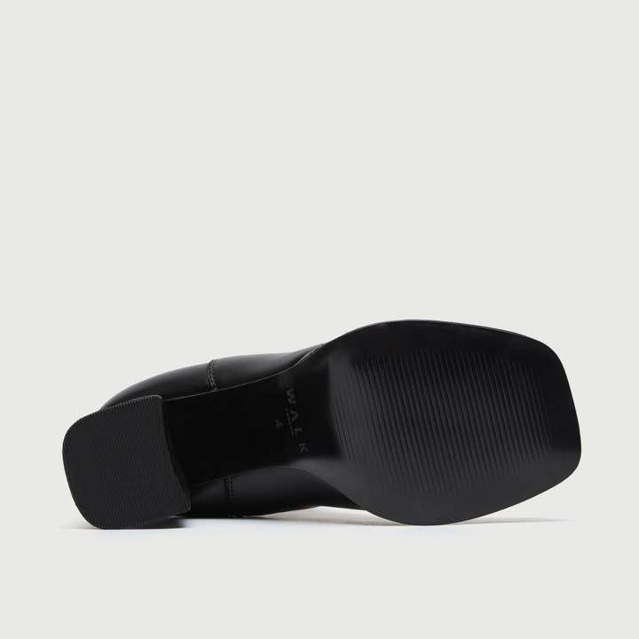Black Poppy Chelsea Boot for wholesale on Faire
