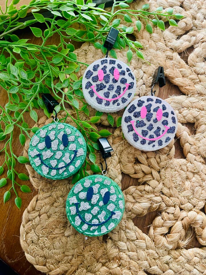 Happy Cheetah Face VENT Clip Car Freshie (set of 2) for wholesale by Stay Fresh’ies Air Fresheners