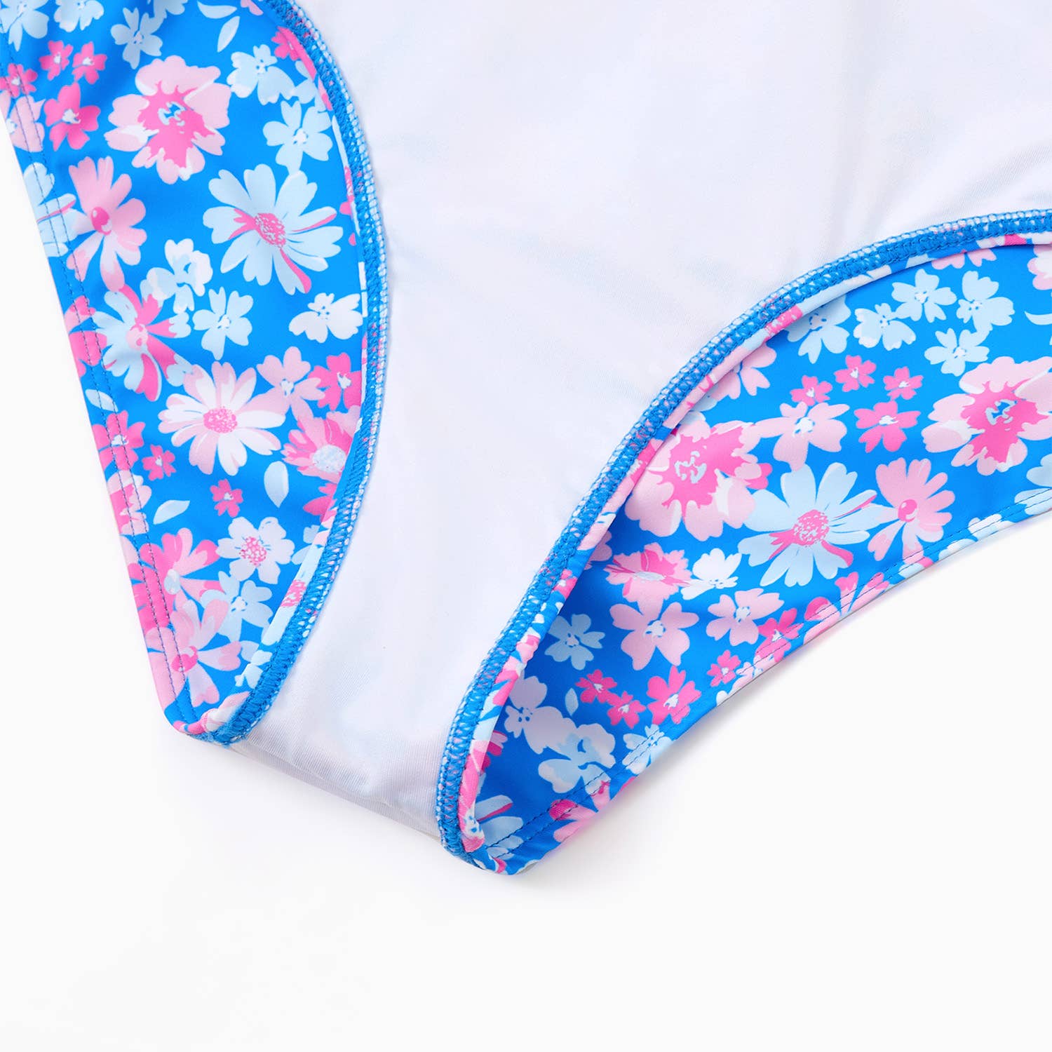 Blue Couple Matching Flora Swim Trunks or One-piece Swimsuit for wholesale on Faire5