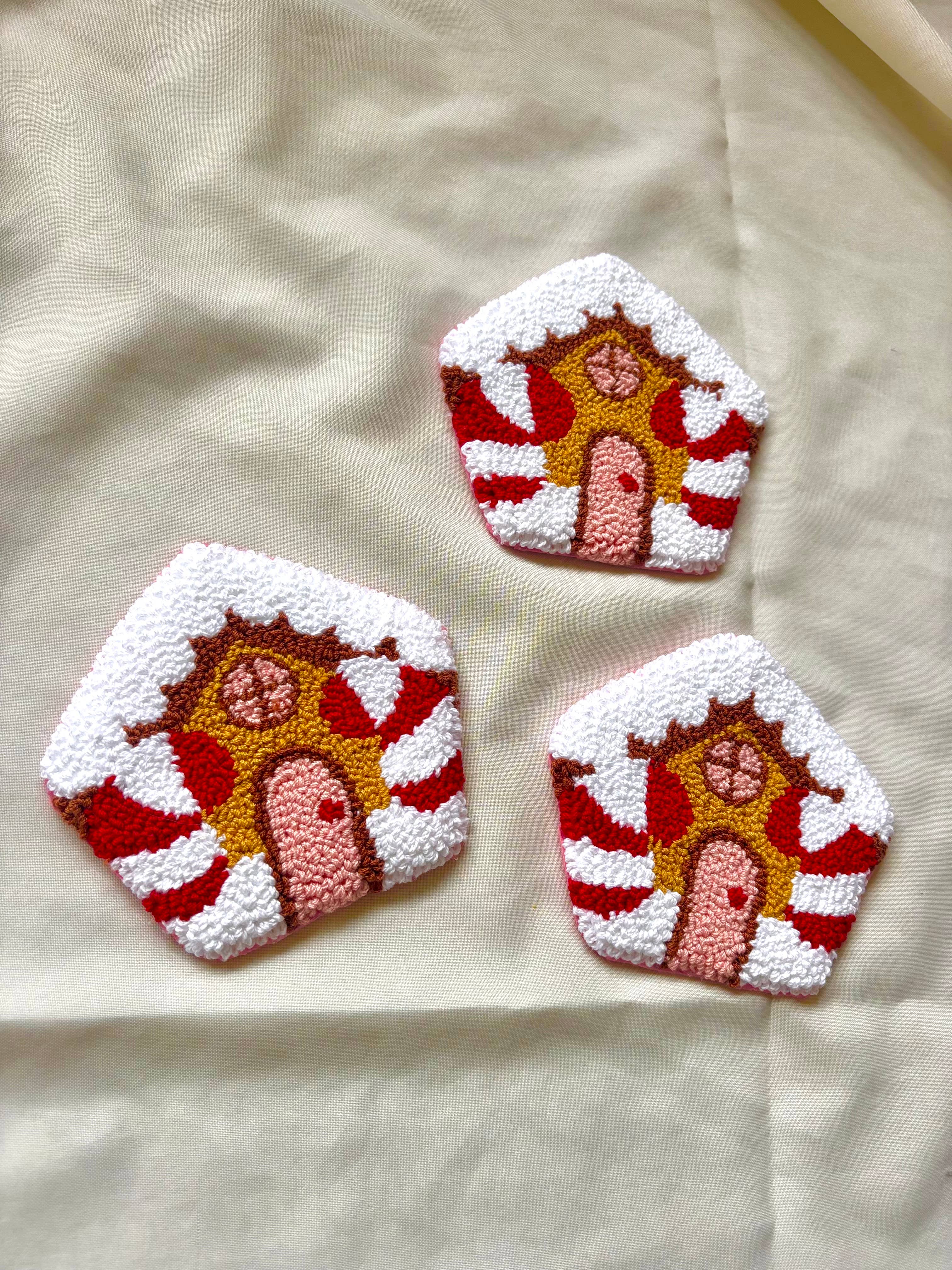 Honey Punches - Venta al por mayor Posavasos - Casitas de jengibre navideñas hechas a mano posavasos de aguja perforada1