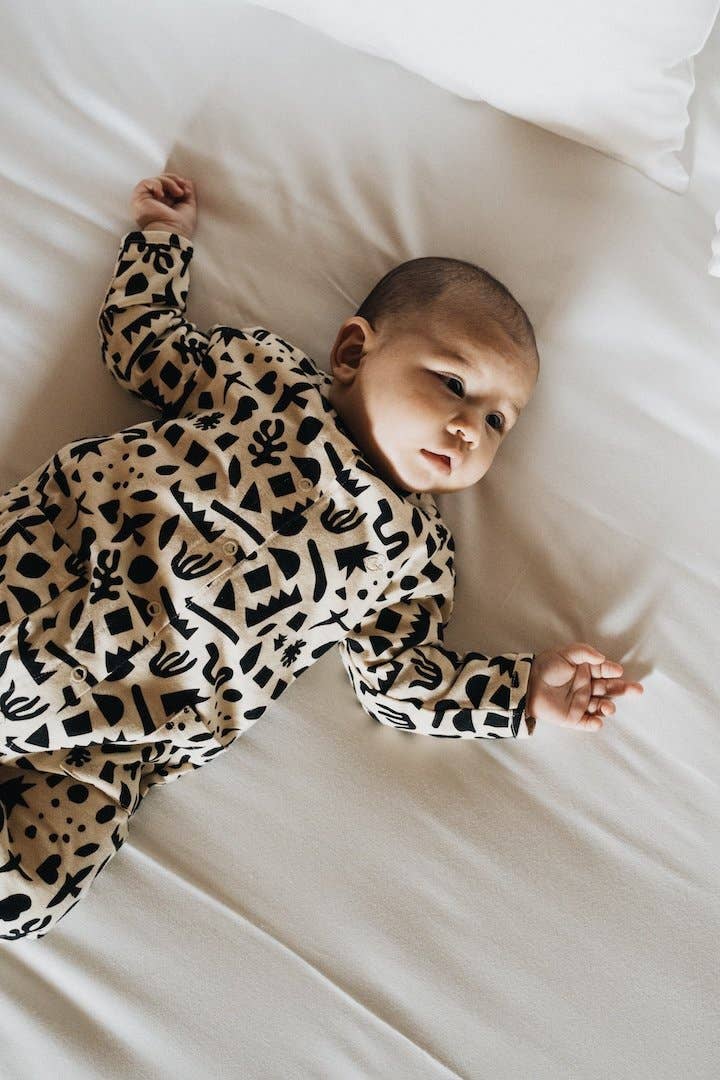 Geometric baby jumpsuit 100% organic cotton for wholesale on Faire0
