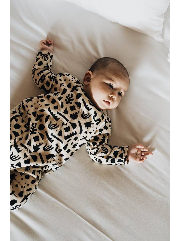 Geometric baby jumpsuit 100% organic cotton for wholesale on Faire