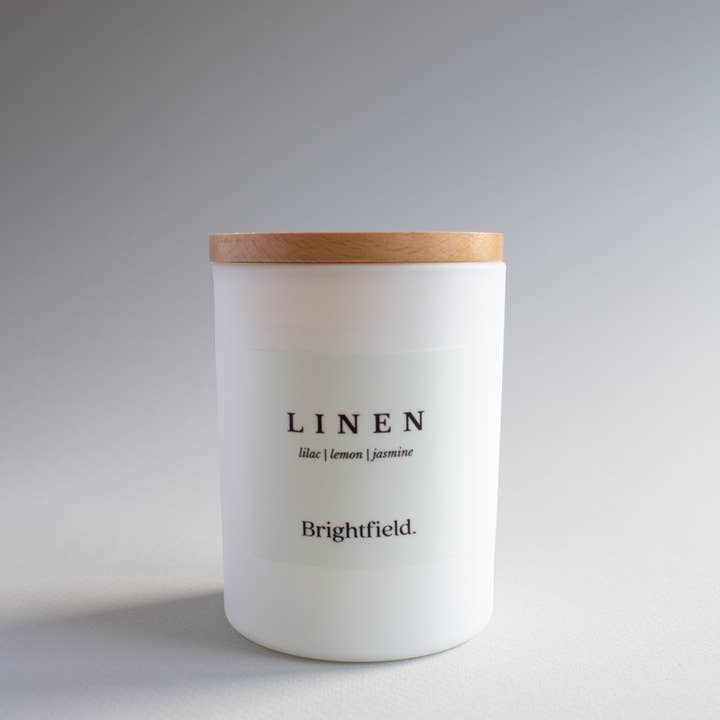 Brightfield - Wholesale Jar/Filled Candle - Linen Non-Toxic Sustainable Coconut Soy Candle w/ Wood Wick