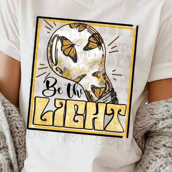 Camiseta BE THE LIGHT para venta al por mayor de Hello Sunshine Boutique
