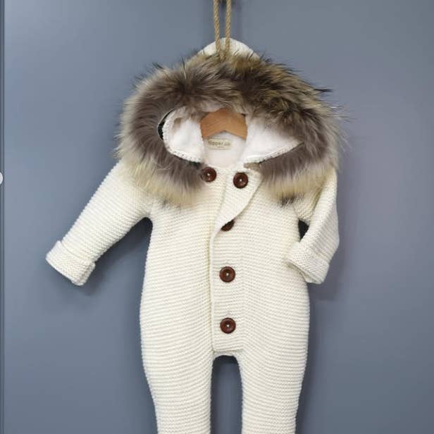 Knitted Wool Romper with Hood & Removable Fur for wholesale by Nipperland