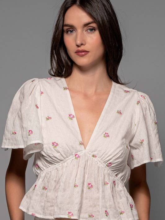 Embroidered Rosebud Peplum Top for wholesale by Urban Daizy