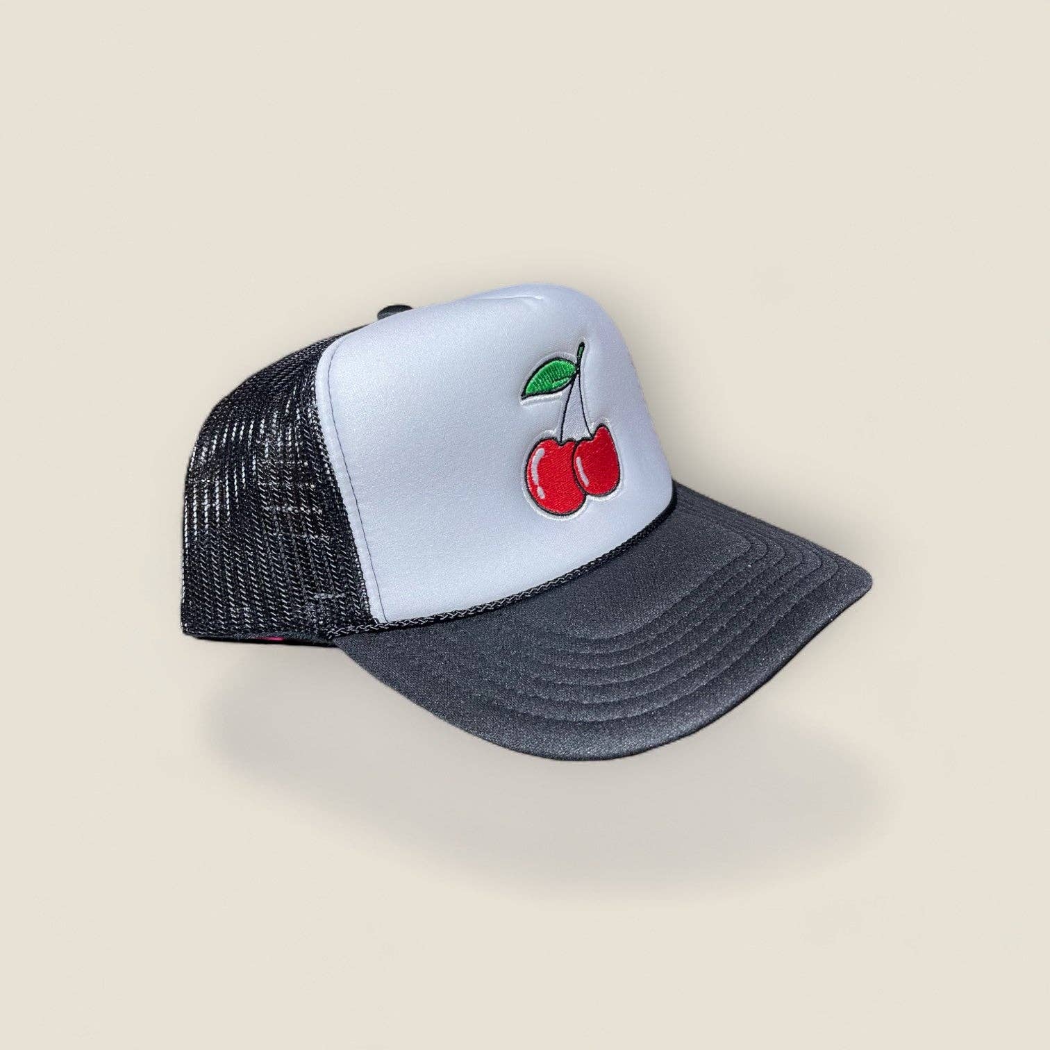 Black White Cherry Bomb Trucker Hat | Black/White for wholesale on Faire1