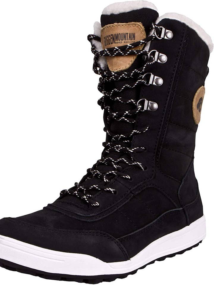 GUGGEN Mountain HPC58 Damen Fellstiefel gefüttert mit echter Lammwolle Winterstiefel wasserdicht per la vendita all'ingrosso da parte di GUGGEN Mountain