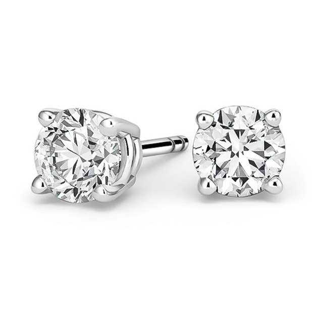 14k White Gold 1/2 Carat Solitaire Genuine White Diamond Stud Earrings. for wholesale by Paris Jewelry