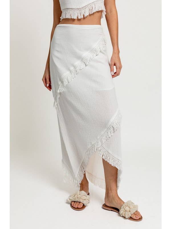 White LOW WAIST FRINGE TRIMMED MAXI SKIRT for wholesale on Faire