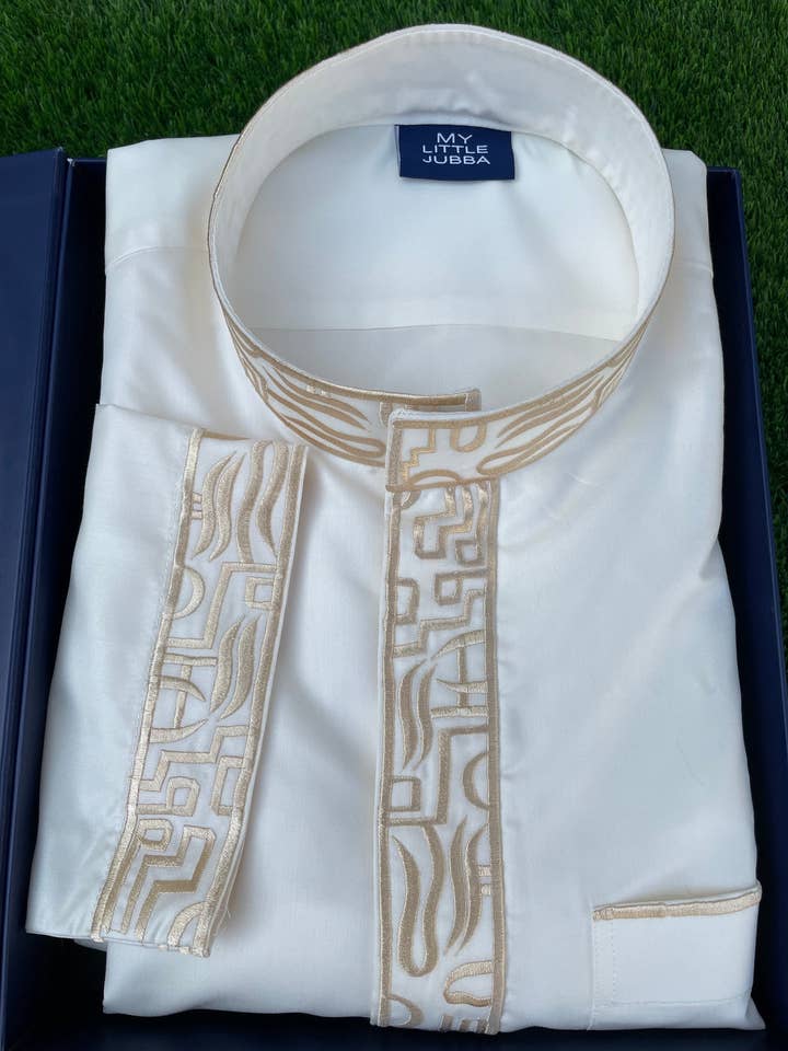 Mens White Saudi Thobe with Gold Embroidery for wholesale by MY LITTLE JUBBA