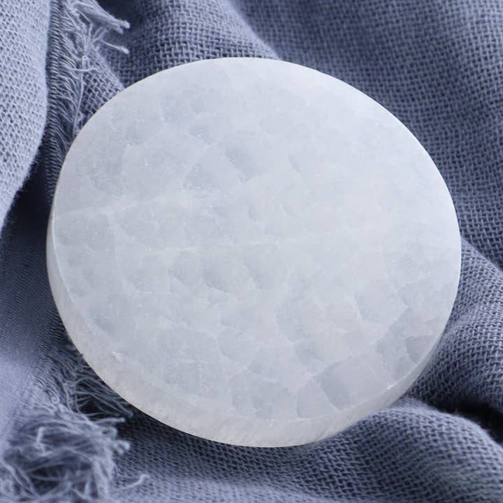 One Selenite (Satin Spar) Round Plate 7 cm for wholesale by Mi Esperanza Minerals