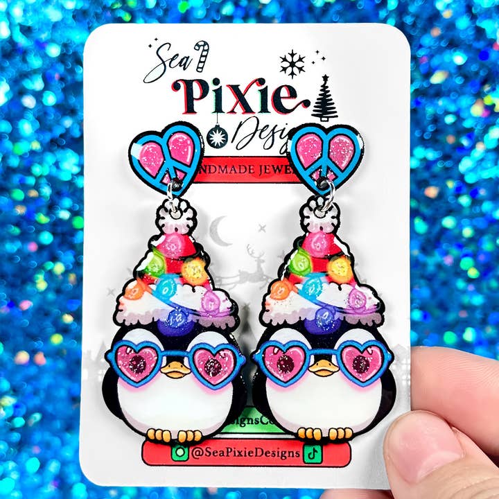 Groovy Glitter Penguin Santa Claus Christmas Dangle Earrings for wholesale by Sea Pixie Designs