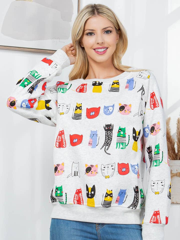 Colorful Cat Fleece Sweatshirt and other Purchase Wholesale cat sweater. Free Returns & Net 60 Terms on Faire trending on Faire.