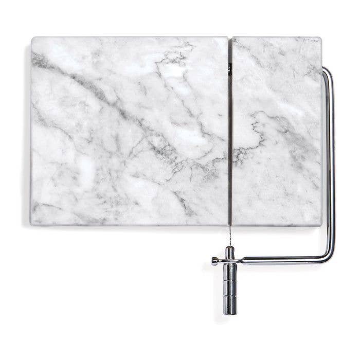 Maison Du Fromage Marble Cheese Slicer and other Purchase Wholesale tableau blanc. Free Returns & Net 60 Terms on Faire trending on Faire.